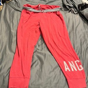 Pink Victorias Secret jogged sweatpants with “angel” on leg